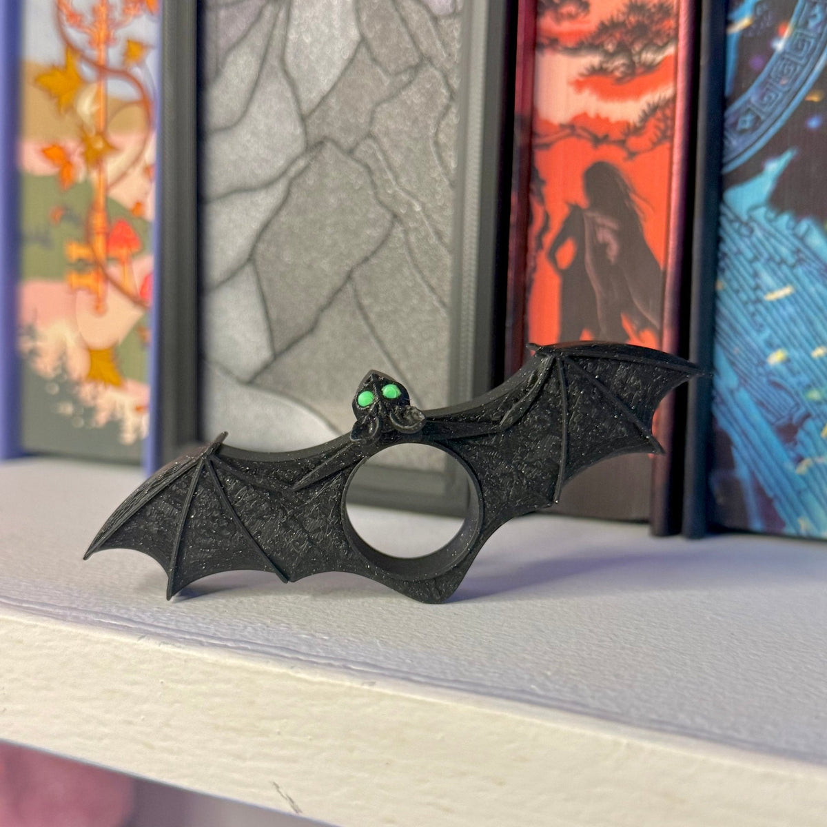 Green-Eyed Bat Thumb Book Holder